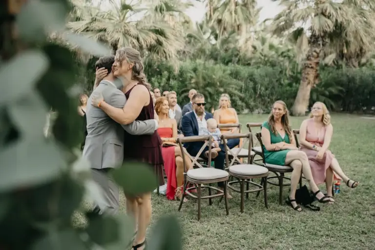 Wedding ceremony among the palm trees at Acre Resort, Los Cabos
