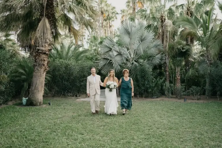 Wedding ceremony among the palm trees at Acre Resort, Los Cabos