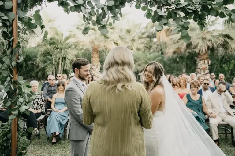 Wedding ceremony among the palm trees at Acre Resort, Los Cabos