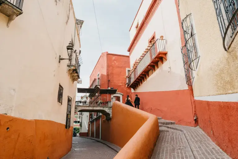 Guanajuato engagement session colorful alley wide