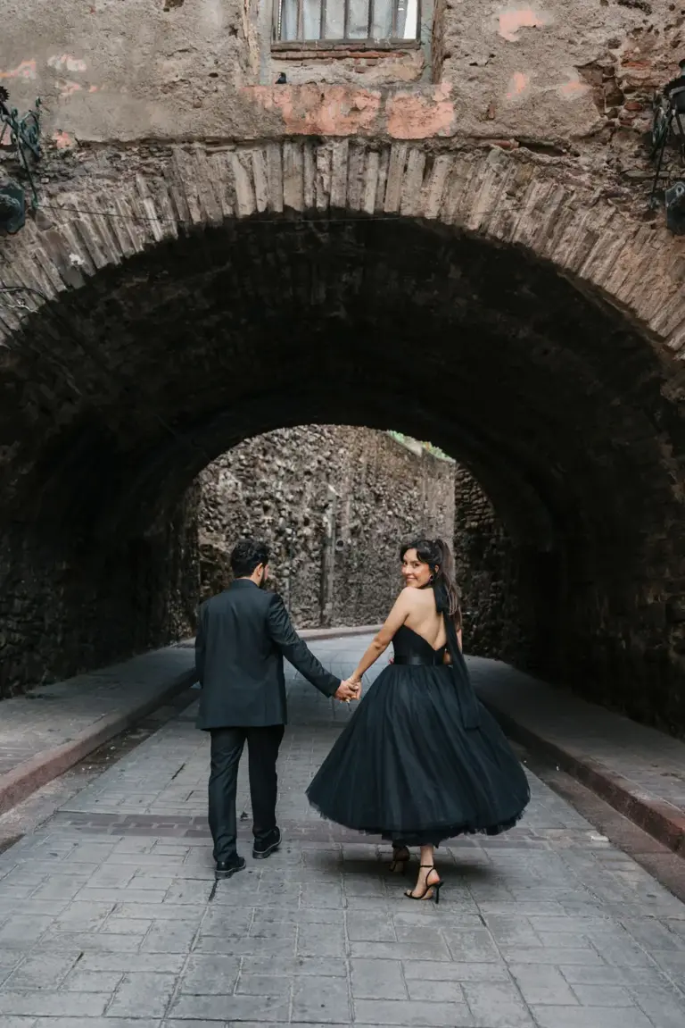 Guanajuato engagement walking stone tunnel black dress