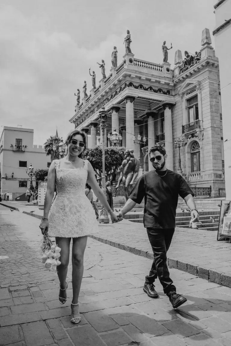 Teatro Juarez facade engagement walking black and white